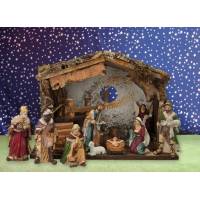 Crèche de Noël : cabane + 11 personnages de 12 cm (33x18x24cm)